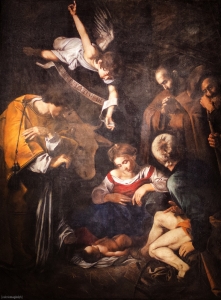 Caravaggio The Nativity With St Francis And St Lawrence